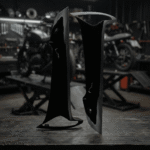 Babero Lateral Externo C100 Wave II Negro Par